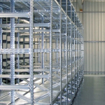 Scaffalatura componibile lunghezza 8,40 metri , altezza 3,00 mt, profondità 80 cm  con 5 ripiani in altezza